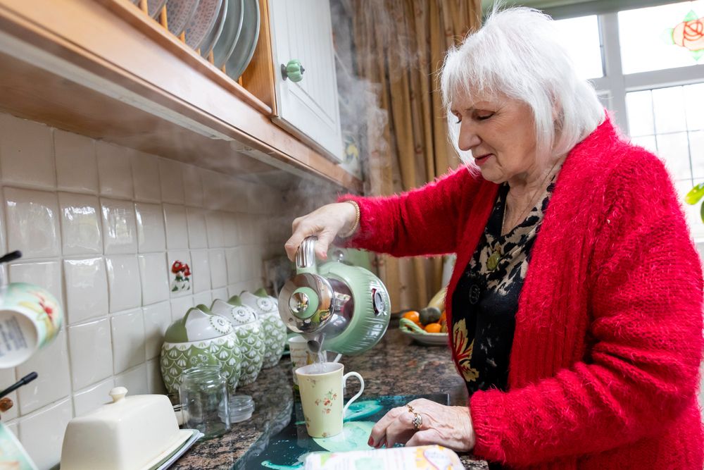 Woman at kitchen counter