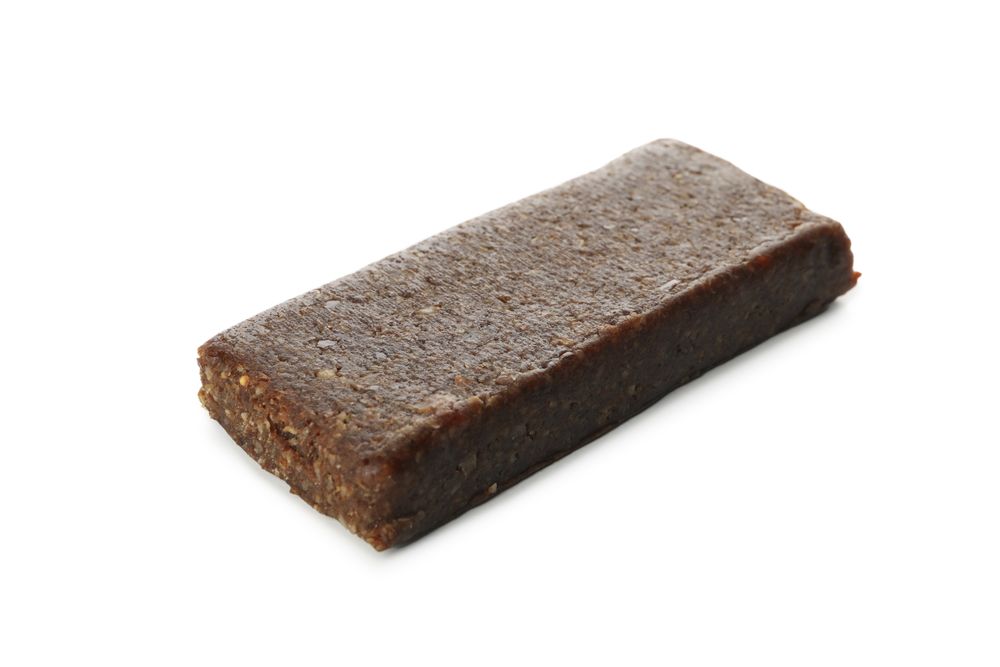 Tasty granola bar isolated on blank background