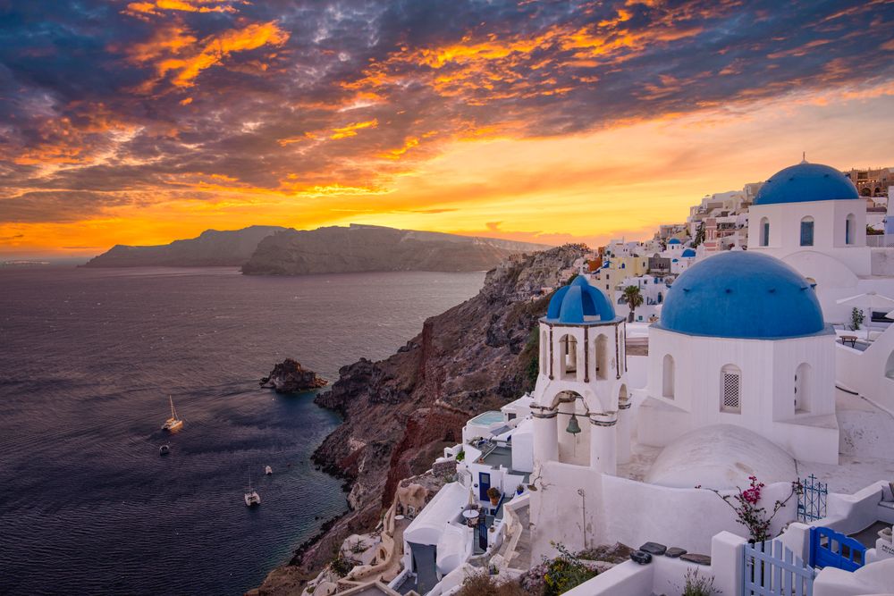 Iconic blue domes of Santorini overlooking the Aegean Sea