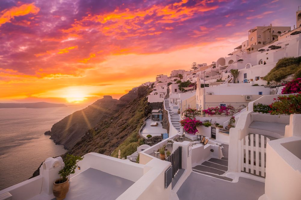 View of the cliffs and Santorini at sunset