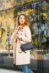 Stylish woman with smartphone on street