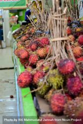 Bunch of lychee fruits for sale in store beXzEq