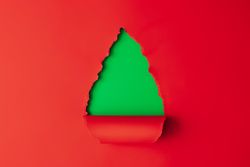 Christmas tree shape made with red and green paper