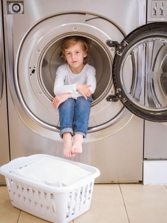 Calm boy in washing machine