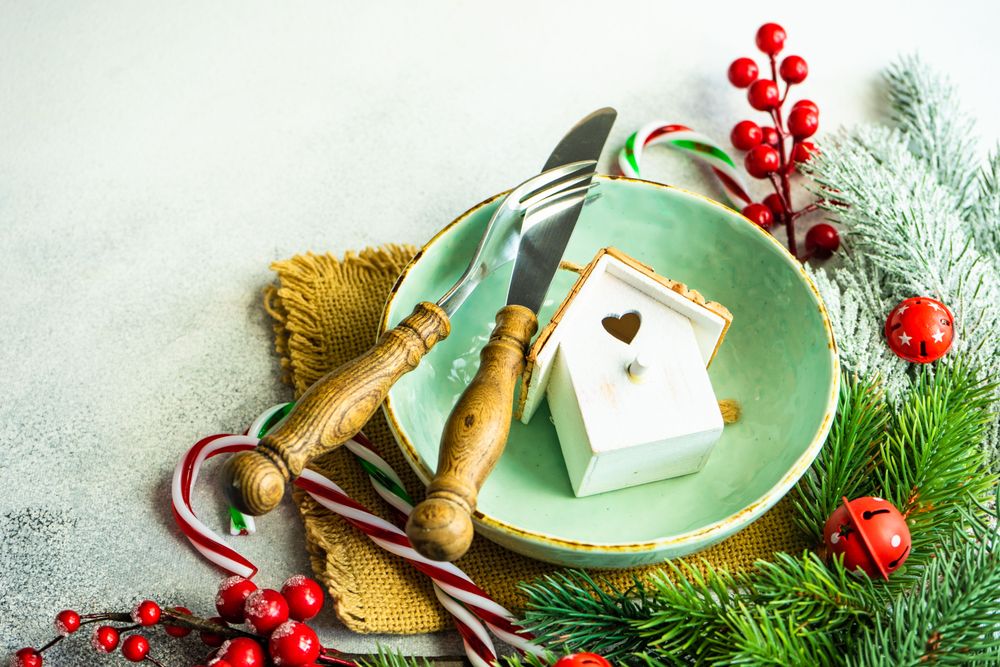 Top view of bird house ornament in green wintry plate
