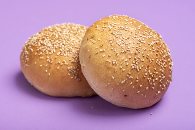 Hamburger buns isolated on a purple color