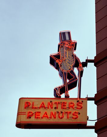 A jaunty-looking, neon "Mr. Peanut" stands high, Columbus, Ohio