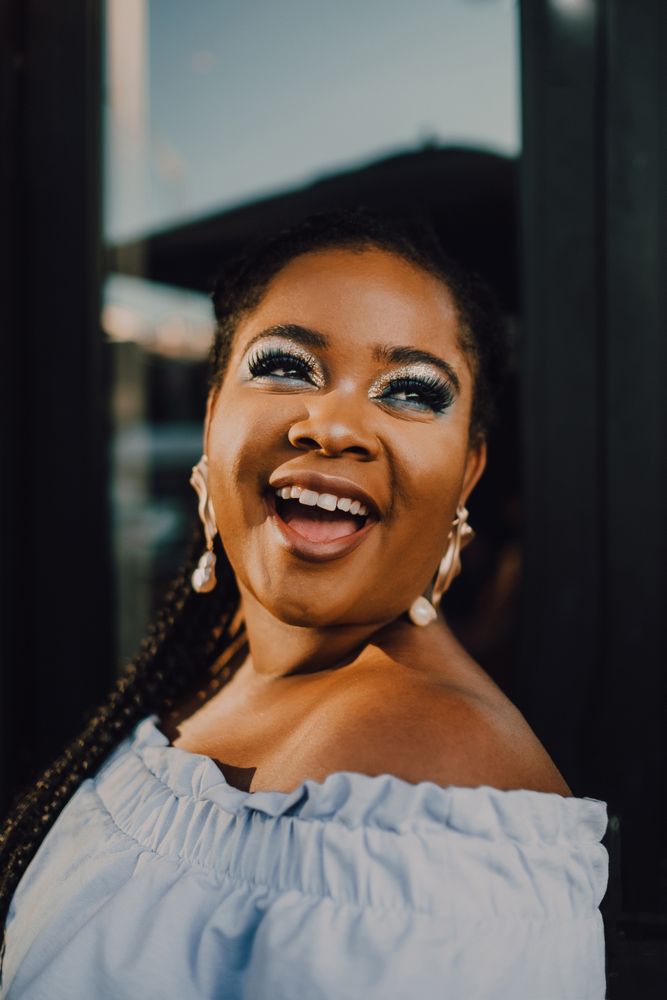 Content trendy Black woman on street