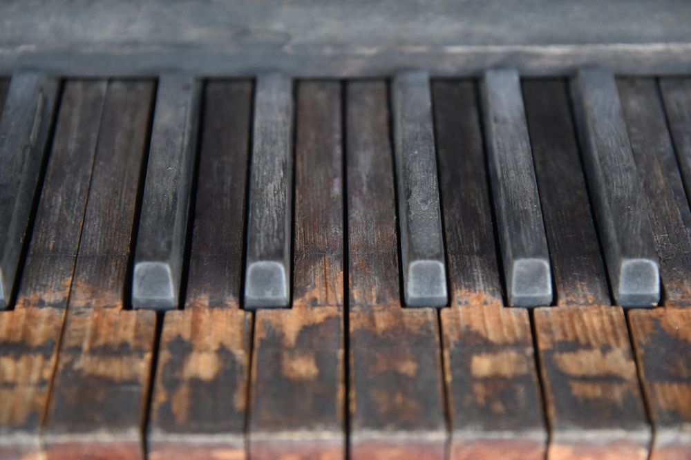 A vintage piano with old keys