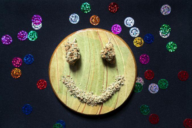 Happy face made from dried marijuana bud