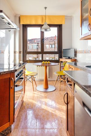 Kitchen on two fronts with dining area