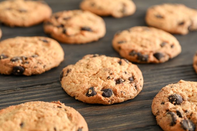 Chocolate chip cookies on wooden background