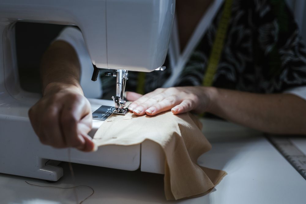 Woman in a sewing school