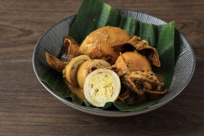 Gulai Cumi Tahu. Squid Curry Stuffed with Tofu