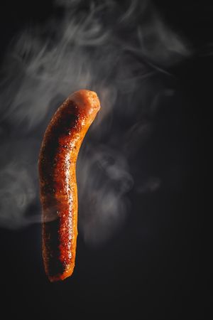 smoke around delicious grilled sausage