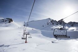Ski lift on a wintry day in the mountains