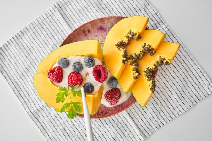 Dessert made of papaya berries and yogurt