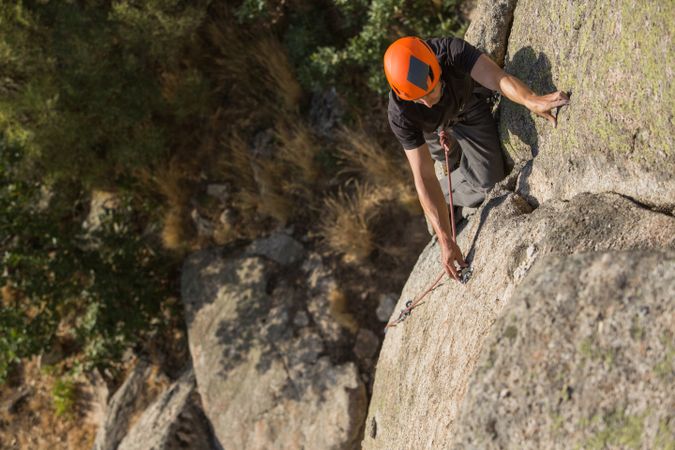 Man climbing a rock