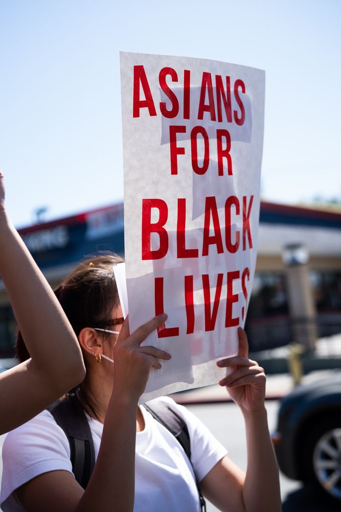 Los Angeles, CA, USA — June 7th, 2020: sign representing solidarity at protest march in East LA