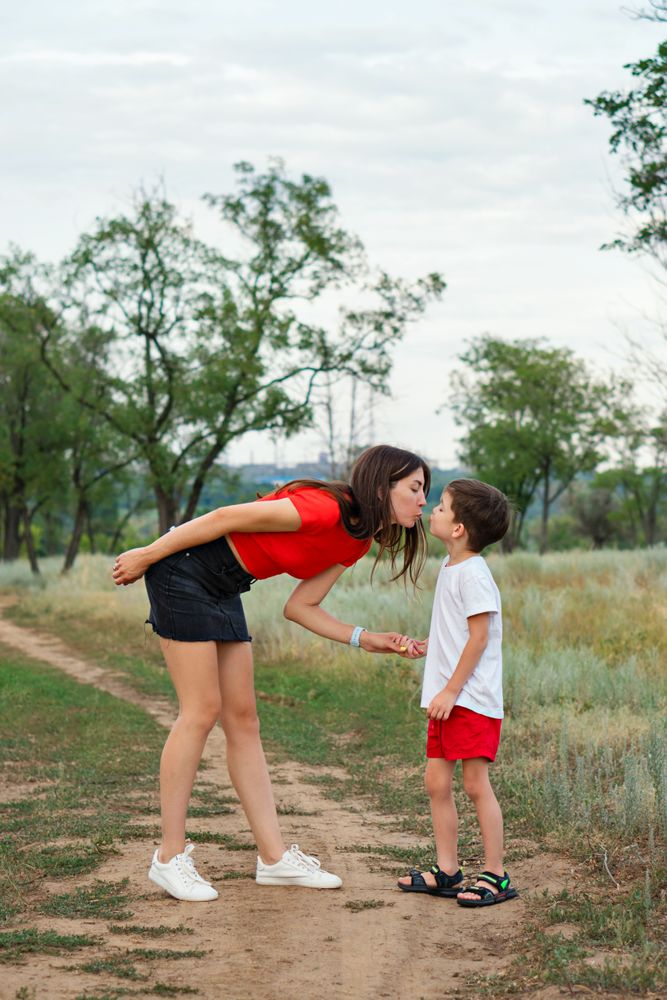Affectionate mom with son outdoor