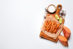 Concept of tasty food - sweet potato fries