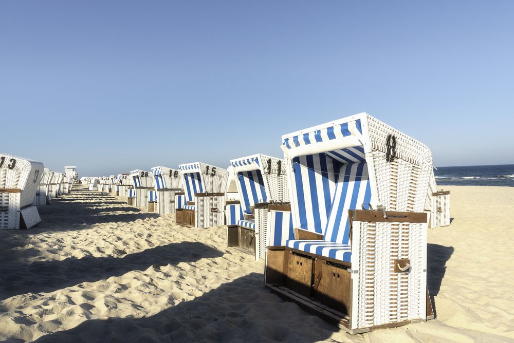 Beach chairs with numbers in rows
