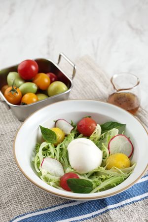 Caprese Salad with Tomatoes and Mozzarella Cheese Balls.