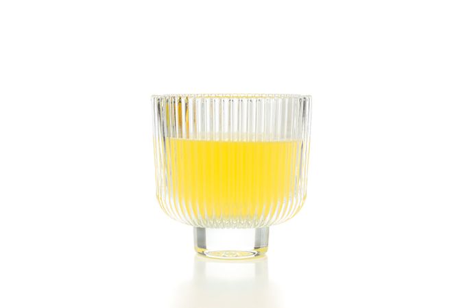 Concept of fresh summer drink - Limoncello cocktail, isolated on light background