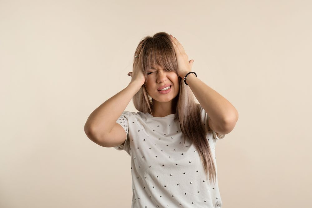 Woman with head hurts