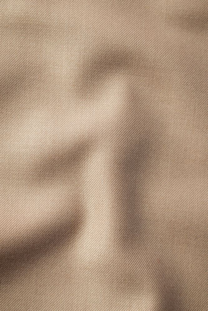 Wavy smooth pattern brown fabric background texture.