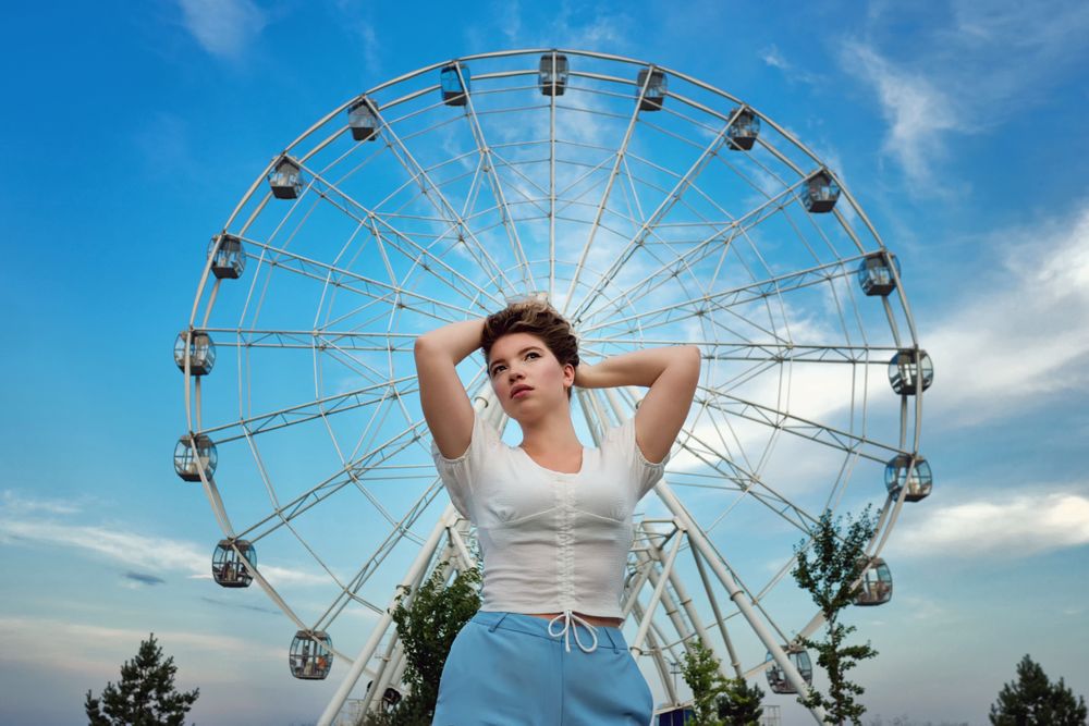 Woman with ferris wheel
