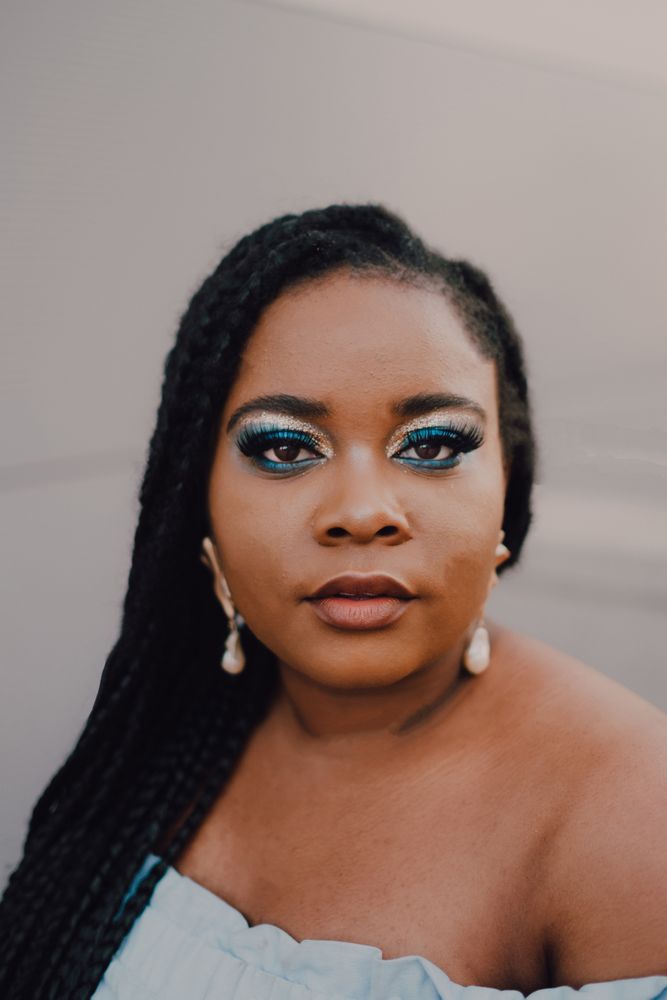 Content trendy Black woman on wall