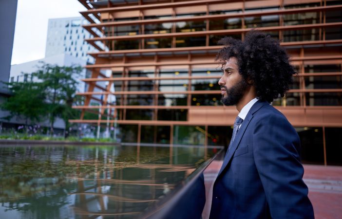 Confident businessman looking away