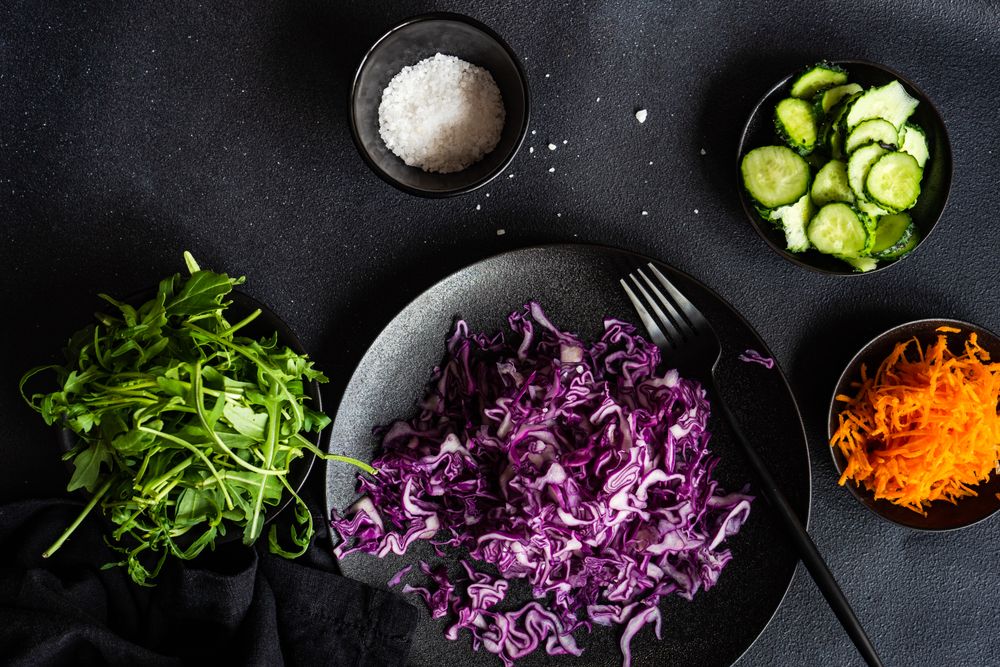 Top view of fresh salad bowl with red cabbage