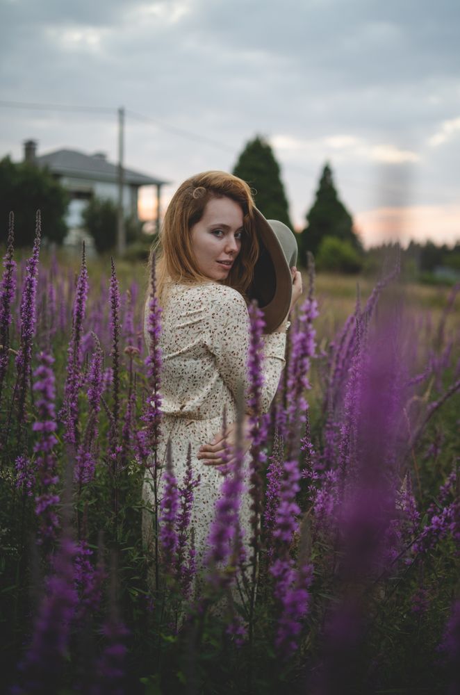 Romantic women in salvia field