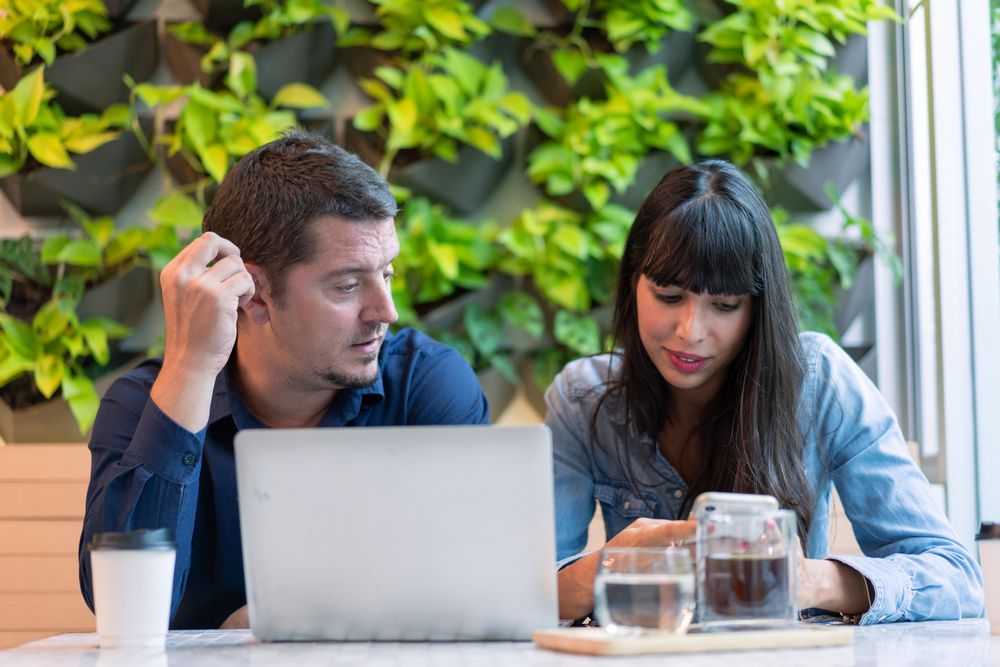 Two people having meeting at coffee shop