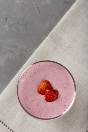 Delicious strawberry mousse in glass goblet.