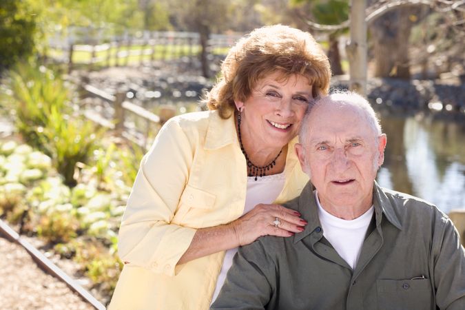 Happy Mature Couple Relaxing in The Park
