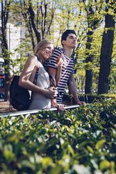 Young tourists couple standing outdoors