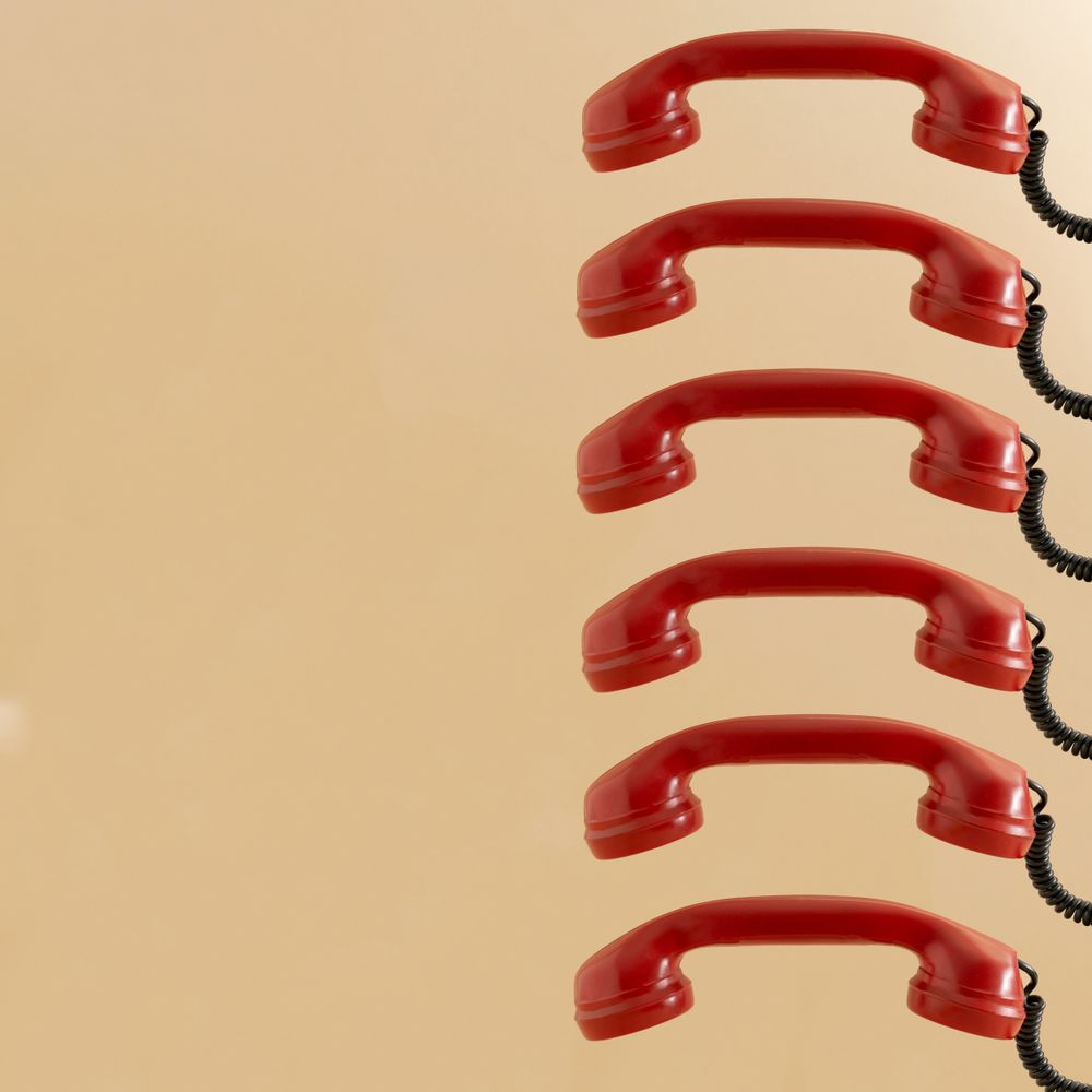 Six vintage red phone ear pieces