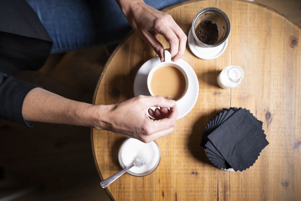 Woman with tea cup in cafe