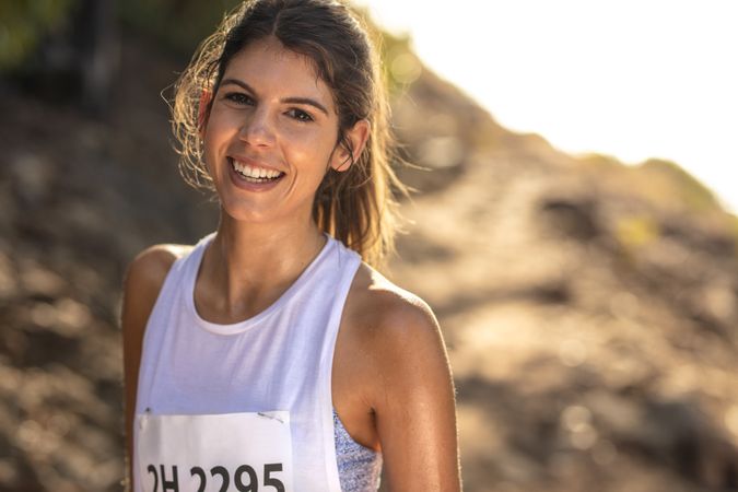 Female runner competing in mountain trail race