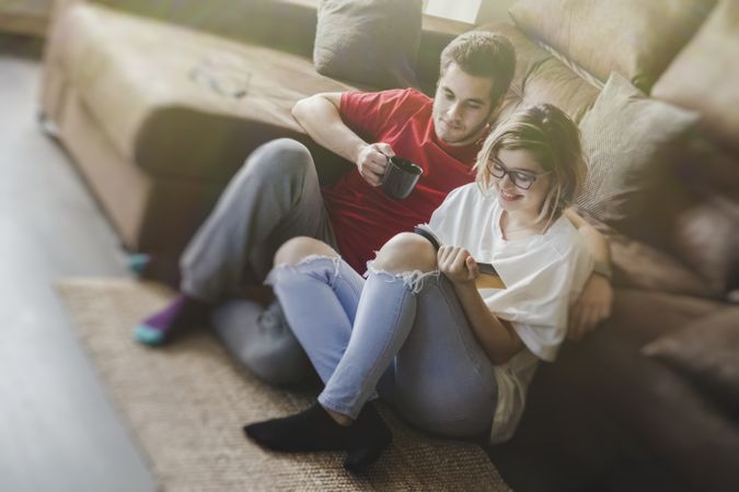 Couple sitting at couch together