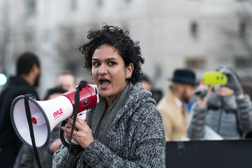 Washington DC, USA - January 27, 2017: Noor Mir speaking at rally against Trump’s Muslim Ban