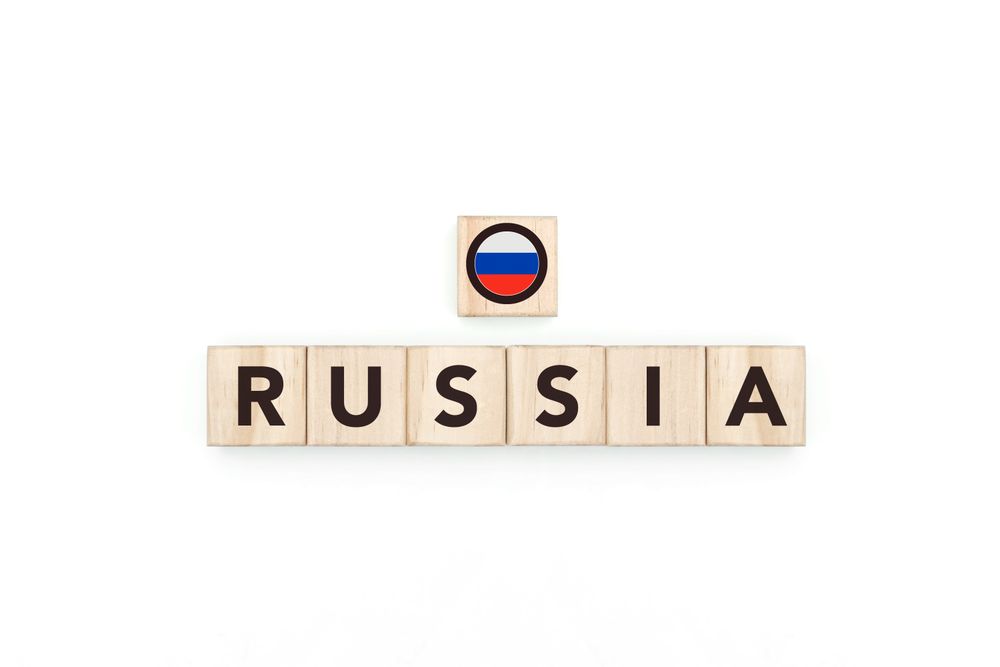 Wooden blocks bearing the name and flag of Russia.