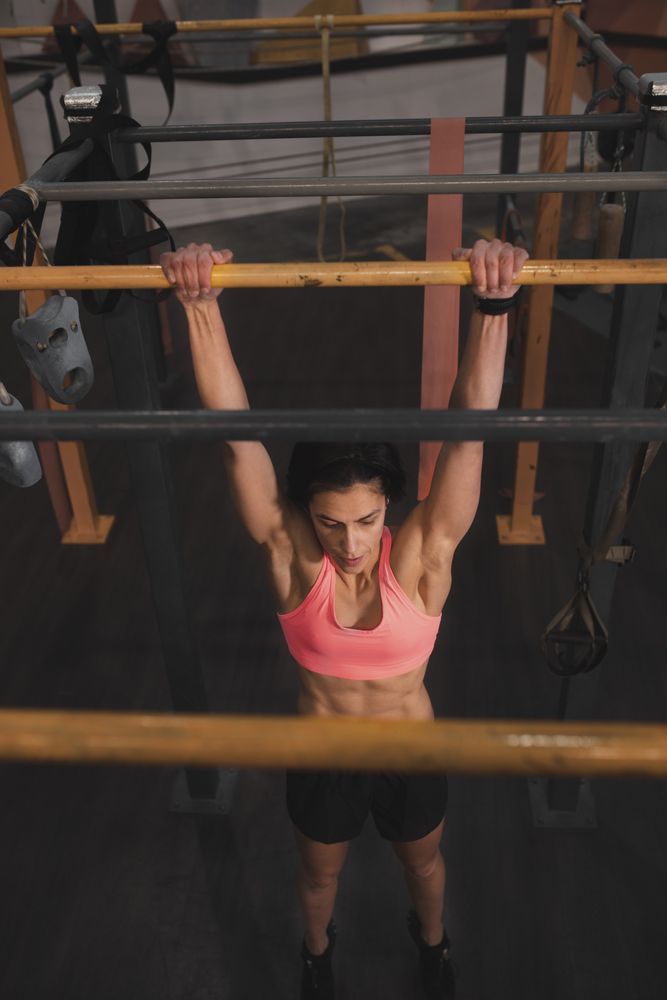 Athletic woman training in gym
