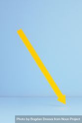 Yellow paper arrow over blue background 43A3Z0