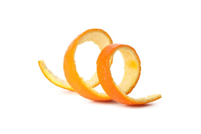 Spiral of mandarin peel isolated on light background