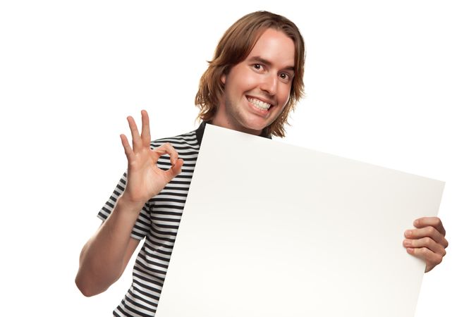 Fun Young Man Holding Blank Sign