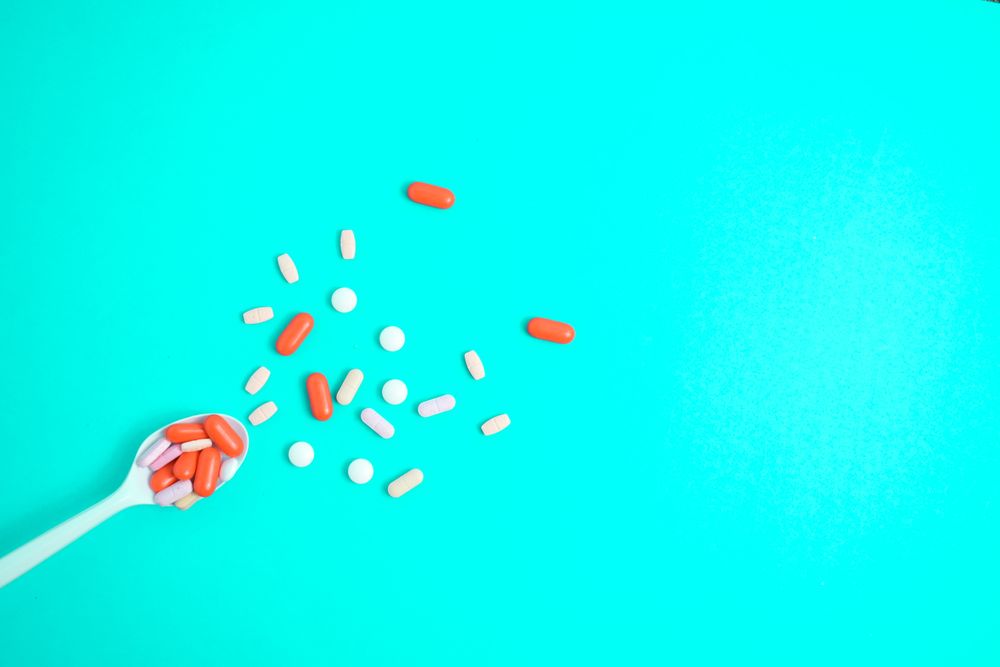 Spoon with variety of tablets